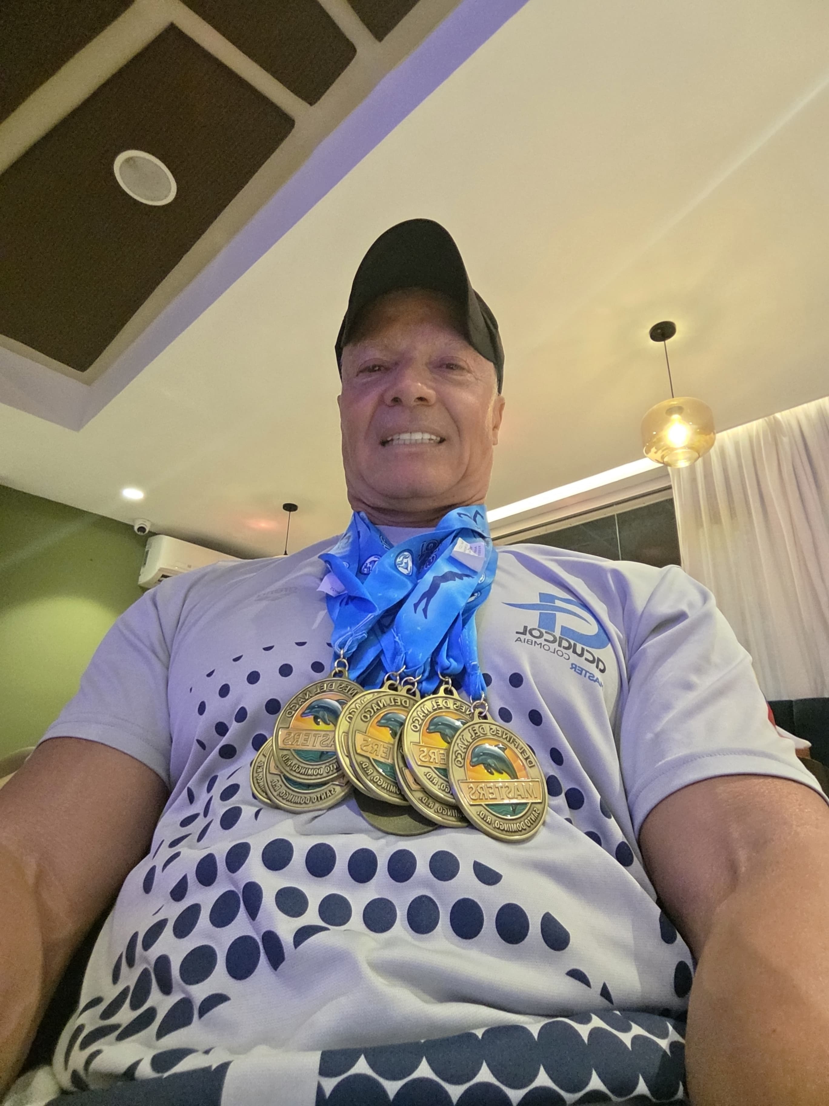 Daniel with swim medals