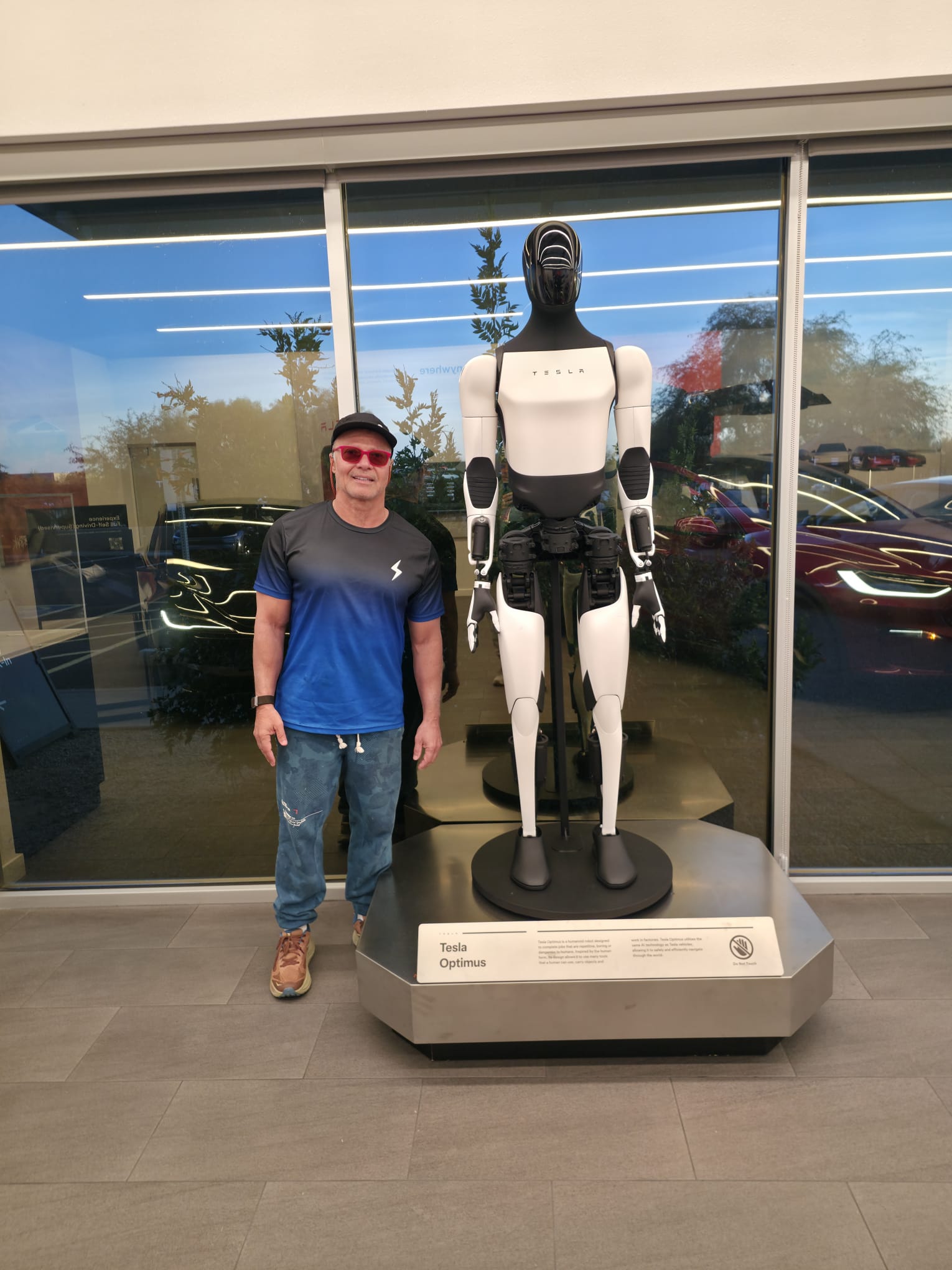 Daniel with Tesla Optimus robot